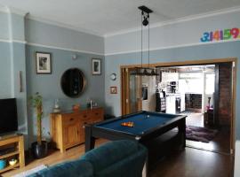 Aigas, quarto em acomodação popular em Glasgow