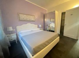 Acquamarina Luxury Rooms, hotel en Budoni