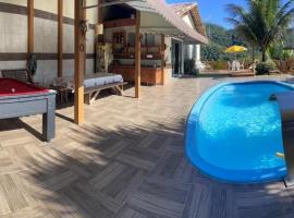 Casa nas montanhas com piscina e vista panorâmica, hotel Domingos Martinsban