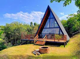 Chalé Recanto - ofurô, banheira, vista, cachoeira e lago, hotel in Alexânia