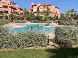 Modern apartment in golf resort with heated pool