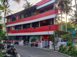 Abhi's cafe avaduthura kovalam, khách sạn ở Kovalam