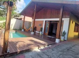 Casa com piscina -100 metros da praia.