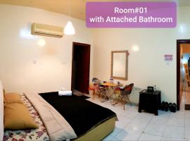 Bzxmax Guest House, habitación en casa particular en Al Ain