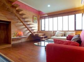 快樂鼠樓中樓6-8人房, hotel com banheiras de hidromassagem em Taitung City