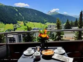 Ferienwohnung Parkareal Davos - freier Blick auf Berge, ruhig, sonnig, SW-Balkon, Parkplatz