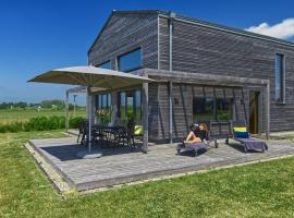 Gud Jard Chalet Nr 04 - Design-Ferienhaus mit exklusiver Ausstattung, Hotel in Pellworm