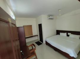Masterkey Deluxe Rooms, hotel di Kakkanad