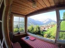 Chalet Sonnenheim mit atemberaubender Aussicht, Hütte in Adelboden