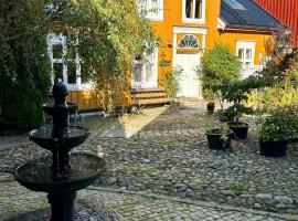Tollgaarden Gjestegaard, hotel v destinaci Larvik
