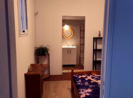 Chambre chez Jo, δωμάτιο σε οικογενειακή κατοικία σε Saint-Paul