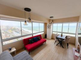 Nuevo apartamento con vista al mar a 15 min del aeropuerto, hotel cerca de Puerto del Callao, Lima