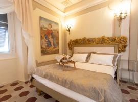 Palazzo Lari Luxury Accommodation, hotel de lujo en Sarzana