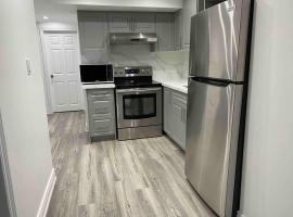 Adorable 2-Bedroom Basement with Sep Entrance, hotel in Ajax