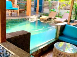 Villa Amuntai with Pool & Jacuzzi, Familienhotel in Dinalupihan