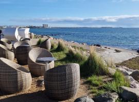 Wohnwagen auf dem Wulfenerhals ca 150m bis zum Meer, hotel v destinaci Fehmarn