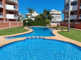 Apartamento planta baja con piscina