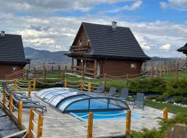 Domki Zagroda Domek z bala z basenem, cabin in Słopnice