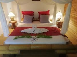 Bungalow atypique Ti Bambou à 500m de la plage, ξενοδοχείο σε Sainte-Anne