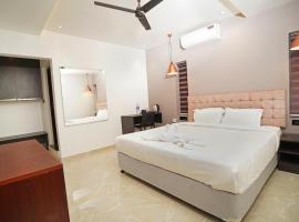 7 The Business Hotel, hotel di Aluva