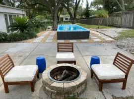 Reel relaxing across from River in Huge 24 foot Swim Spa