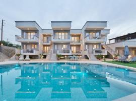 New cozy apartments in Crete Coast with pool and dining area โรงแรมในMagnisía