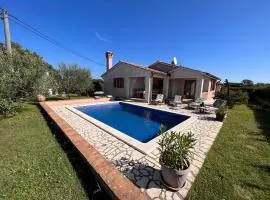 Villa Mirela with a comfortable garden and pool