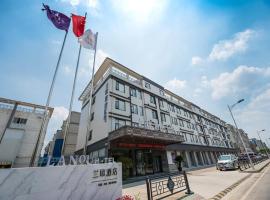 LanOu Hotel Wuxi Anzhen East High-Speed Railway Station, hotel sa 3 zvezdice u gradu Vusi