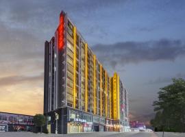 Xuchang में LanOu Hotel Xuchang Caowei Ancient City, पार्किंग वाला होटल