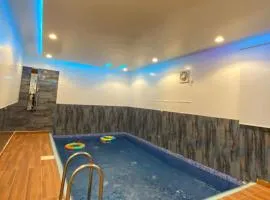 شاليهات غيوم الوسام للفلل الفندقية الفاخرة、ターイフのシャレー