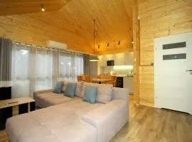 Całoroczny drewniany domek Superior i apartamenty Eko-oaza w Krynica Morska-Piaski