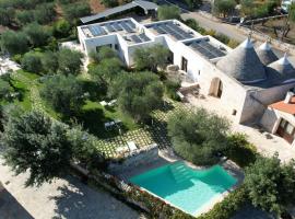 Rifugio di Puglia - Trulli & Dimore, nakvynės su pusryčiais namai Alberobele