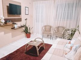 Apartamento encantador em Lagoinha Paraipaba/CE, hotel amb aparcament a Paraipaba