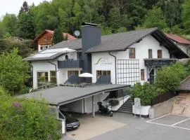 Villa Relax - Ferienwohnungen & Hallenbad & Relaxgarten