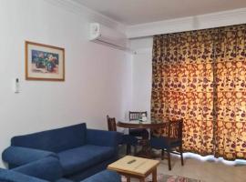 A cozy room in 2 bedrooms apartment with a back yard, campsite in Sharm El Sheikh