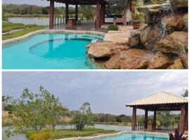 Sítio defronte Lagoa Lagoa na Serra do Cipó, cabana o cottage a Jaboticatubas