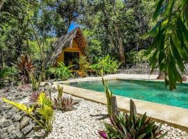 Cabinas de Lou Eco Lodge TAMARINDO, luxusní stan v destinaci Santa Rosa