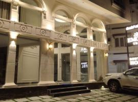 Hotel Emora Tree, hotell i Mysore