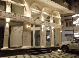 Hotel Emora Tree, khách sạn 3 sao ở Mysore