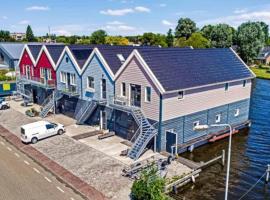 Unieke loft uitzicht water, apartamento en Sneek