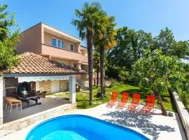 Seaside apartments with a swimming pool Njivice, Krk - 21421