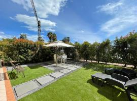 B179 - Riva appartamento con giardino