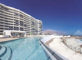 Lindo departamento al borde de la playa, hotel with pools in Iquique