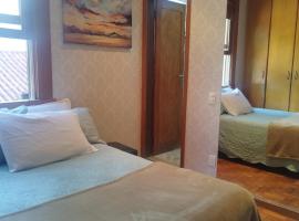 Quarto Suite - SAVASSI BH, hospedagem domiciliar em Belo Horizonte