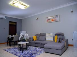Room in Apartment - Three Bedroom Apartment, Familienhotel in Namulanda