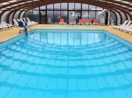 Bungalow de 3 chambres avec piscine partagee jardin amenage et wifi a Onzain, semesterboende i Onzain