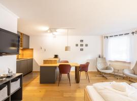7304 Pure Freude in dieser stilvoll renovierten Wohnung mit moderner Kueche, מלון בVulpera