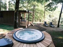 Lodge avec SPA privatif - Foret et Lac, cabana o cottage a Liginiac