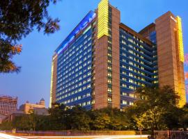 Marriott Executive Apartments Tianjin TEDA, hotel en Binhai