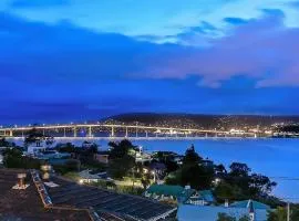 Deep Blue Wow views over river city mountain